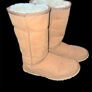Cozy UGG Classic Tall Water Resistant Tan Shearling-Lined Boots